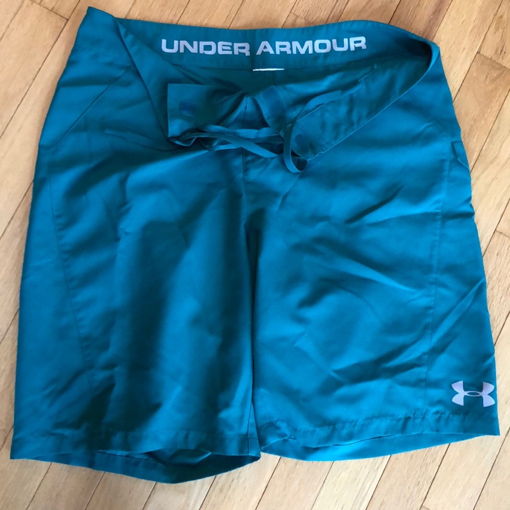 Men’s Under Armour board shorts.